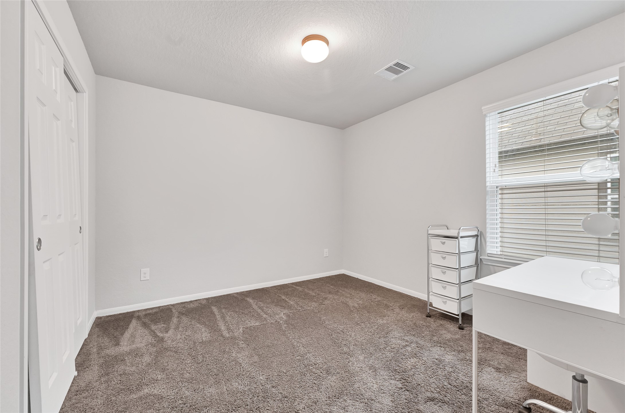 11346 Cascading Stream Way Houston, TX 77044 - Photo 18 of 24 a view of an empty room