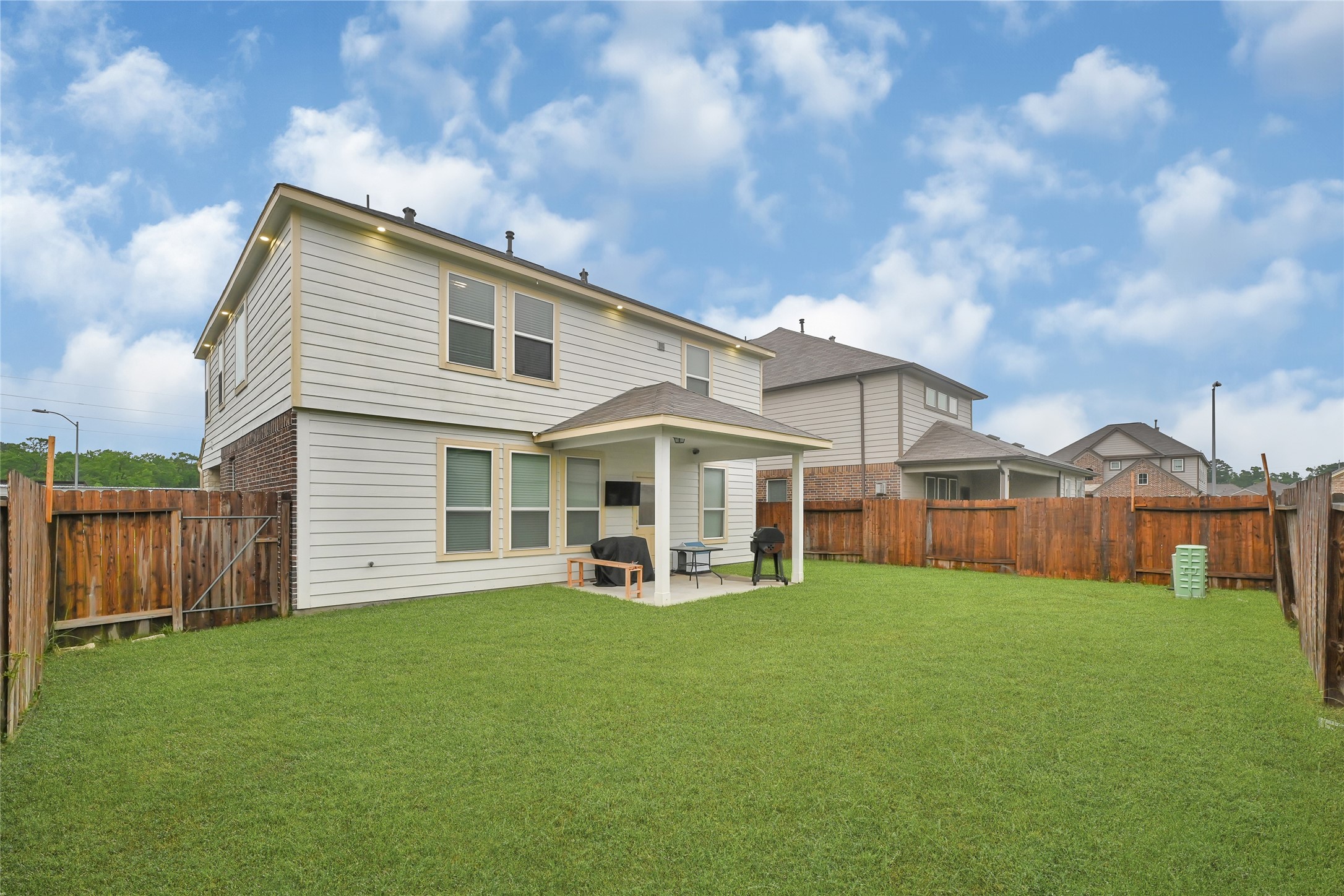 11346 Cascading Stream Way Houston, TX 77044 - Photo 24 of 24 a view of a house with a yard and sitting area