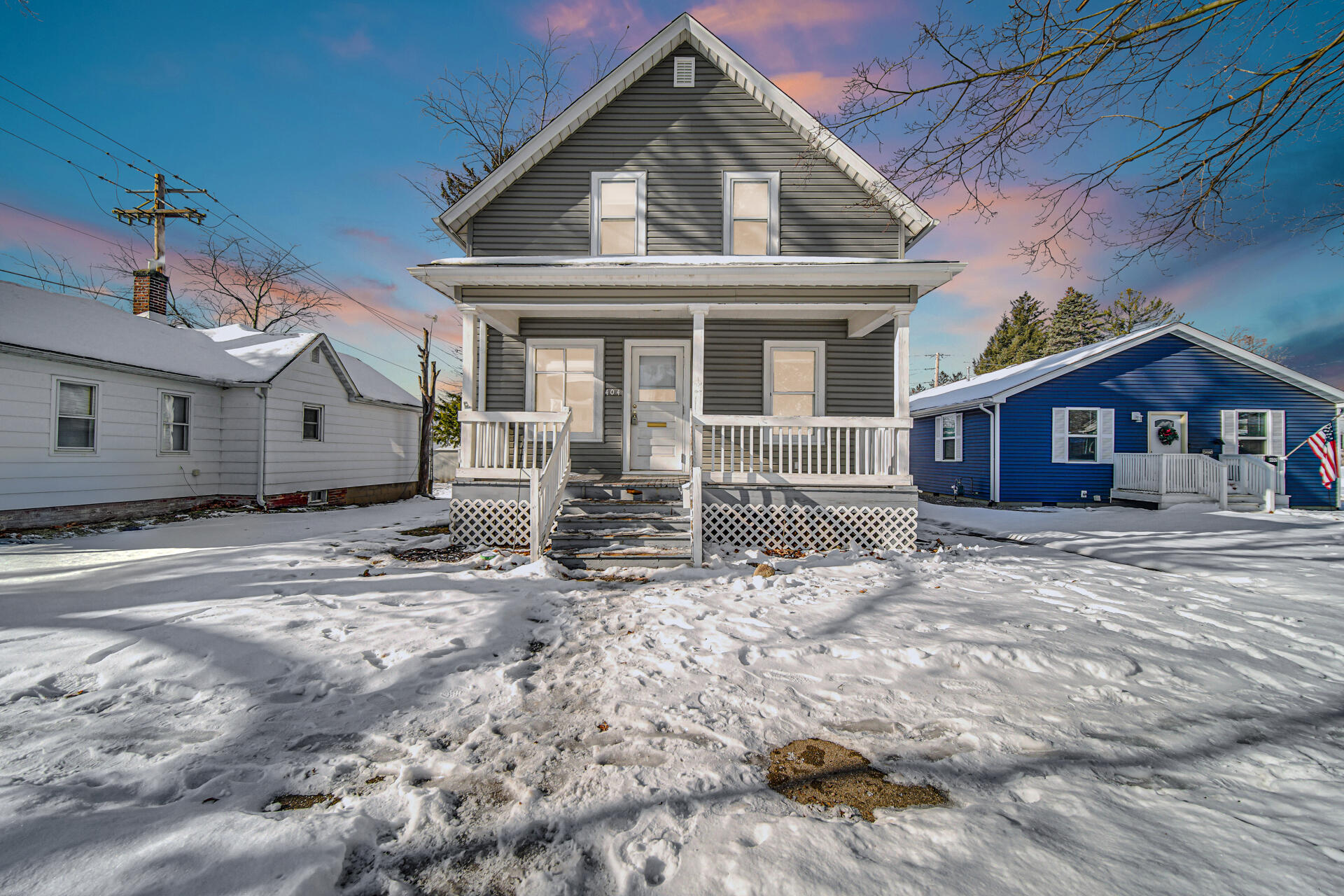 404 F Street La Porte, IN 46350 - Photo 2 of 35 a front view of a house with a yard