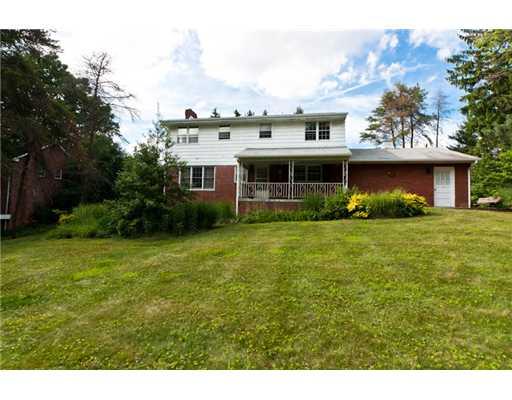 431 McKinney Road Wexford, PA 15090 - Photo 3 of 18 Exterior Back. Covered Rear Porch and Garage Service Door access to Rear Yard...