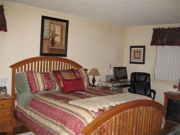 15 Bower Road, Unit B2 Quincy, MA 02169 - Photo 4 of 10 a bedroom with bed and a window
