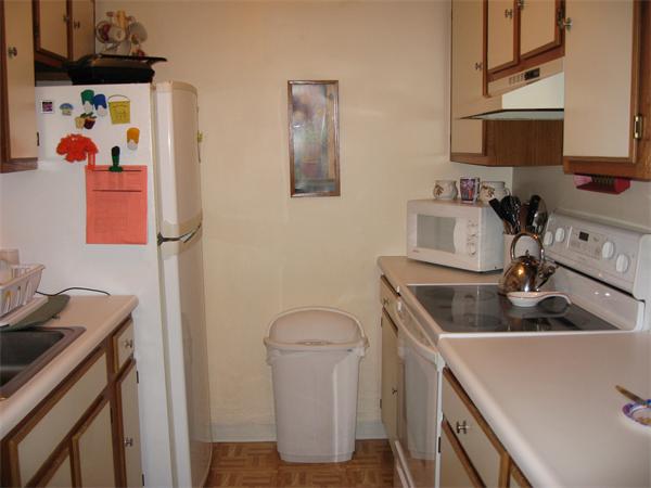 15 Bower Road, Unit B2 Quincy, MA 02169 - Photo 7 of 10 a kitchen with sink cabinets and appliances