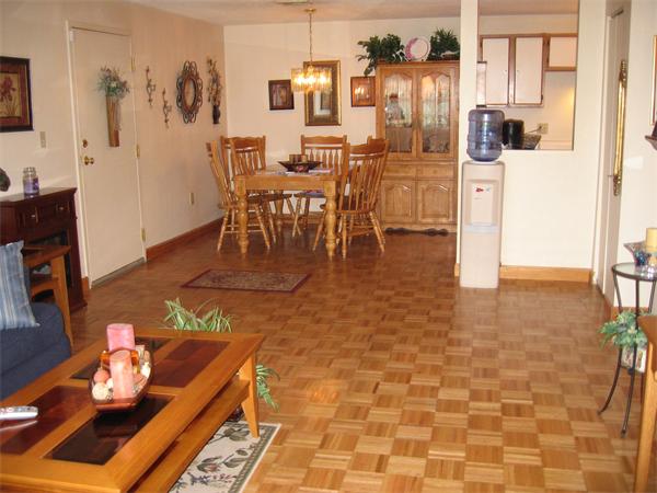 15 Bower Road, Unit B2 Quincy, MA 02169 - Photo 10 of 10 a dining room with furniture and wooden floor