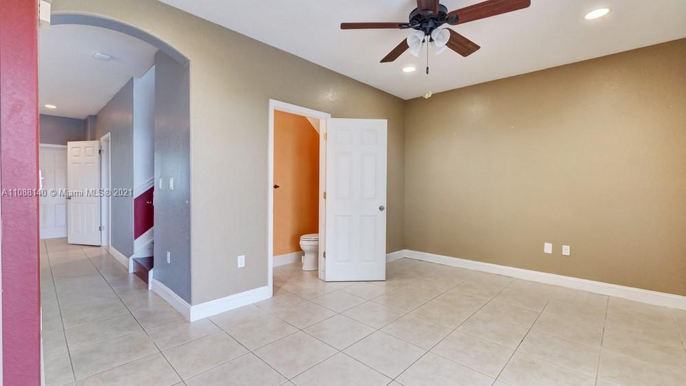 1311 Southeast 20th Road, Unit 1311 Homestead, FL 33035 - Photo 12 of 40 a view of an empty room
