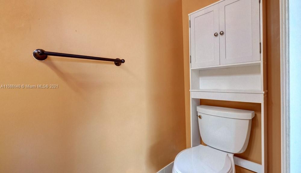 1311 Southeast 20th Road, Unit 1311 Homestead, FL 33035 - Photo 19 of 40 a bathroom with a toilet