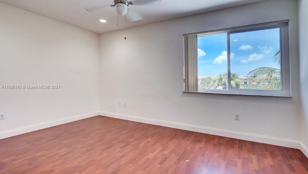 1311 Southeast 20th Road, Unit 1311 Homestead, FL 33035 - Photo 26 of 40 an empty room with a window