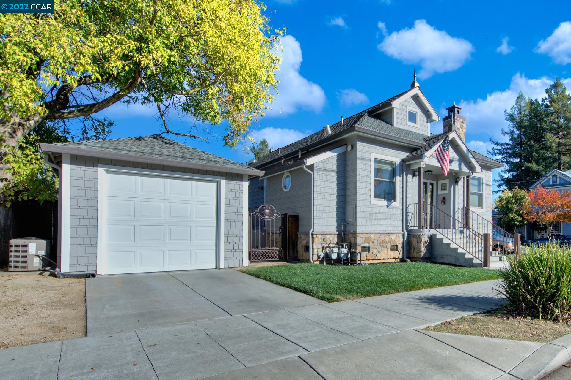 2004 Main Street Napa, CA 94559 - Photo 1 of 7 a front view of a house with a yard and garage