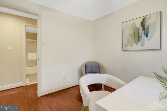 a bathroom with a toilet and a sink