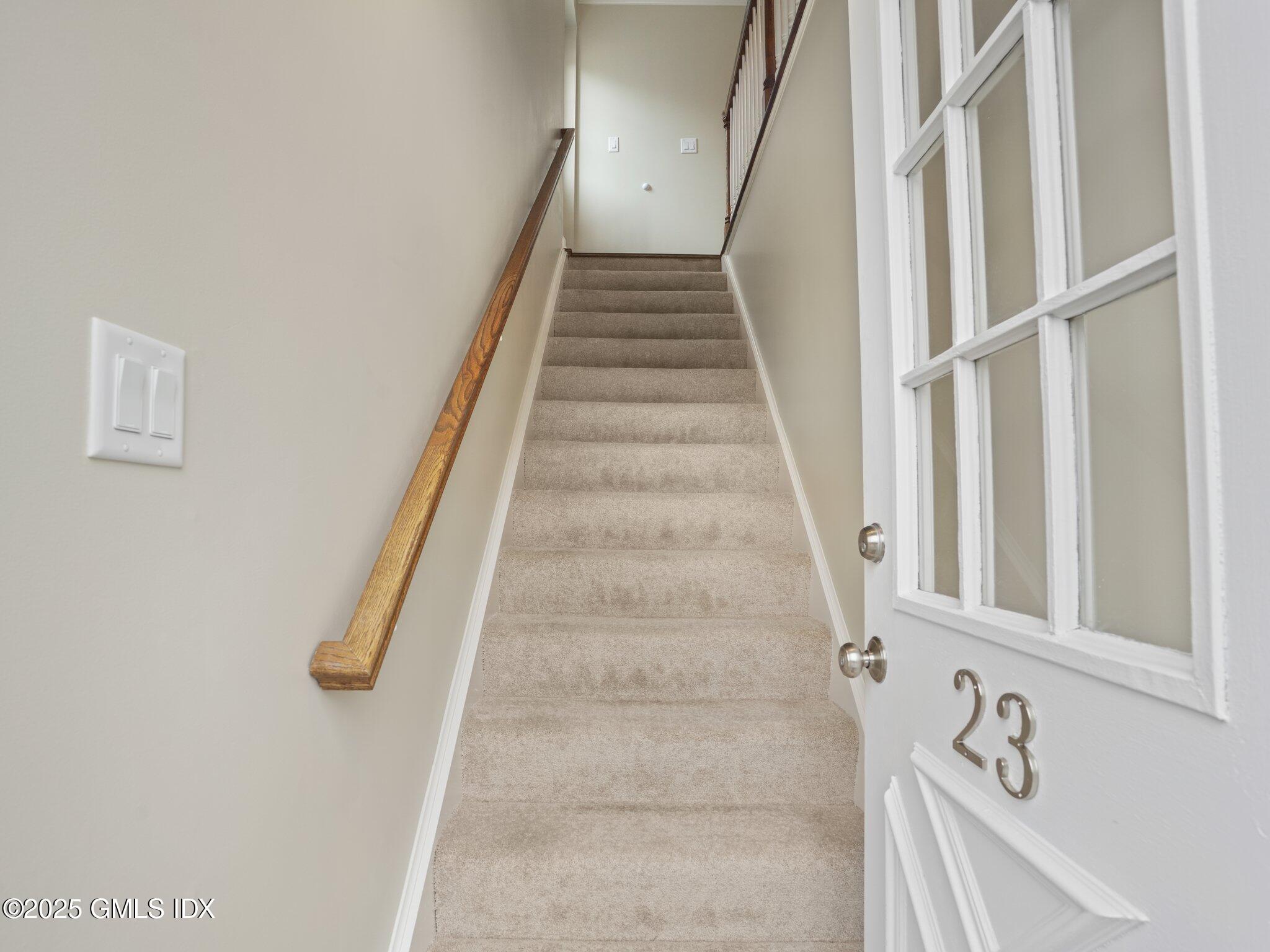 102 Valley Road, Unit 23 Cos Cob, CT 06807 - Photo 3 of 13 a view of staircase with white walls