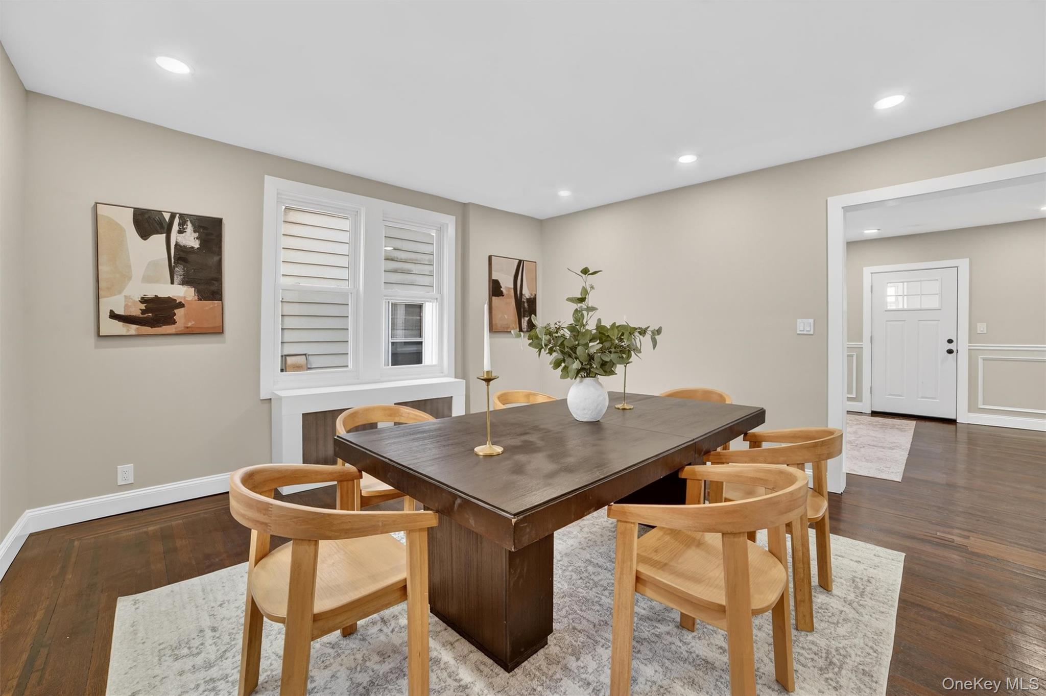 94 Jervis Road Yonkers, NY 10705 - Photo 12 of 50 a view of a dining room with furniture and wooden floor