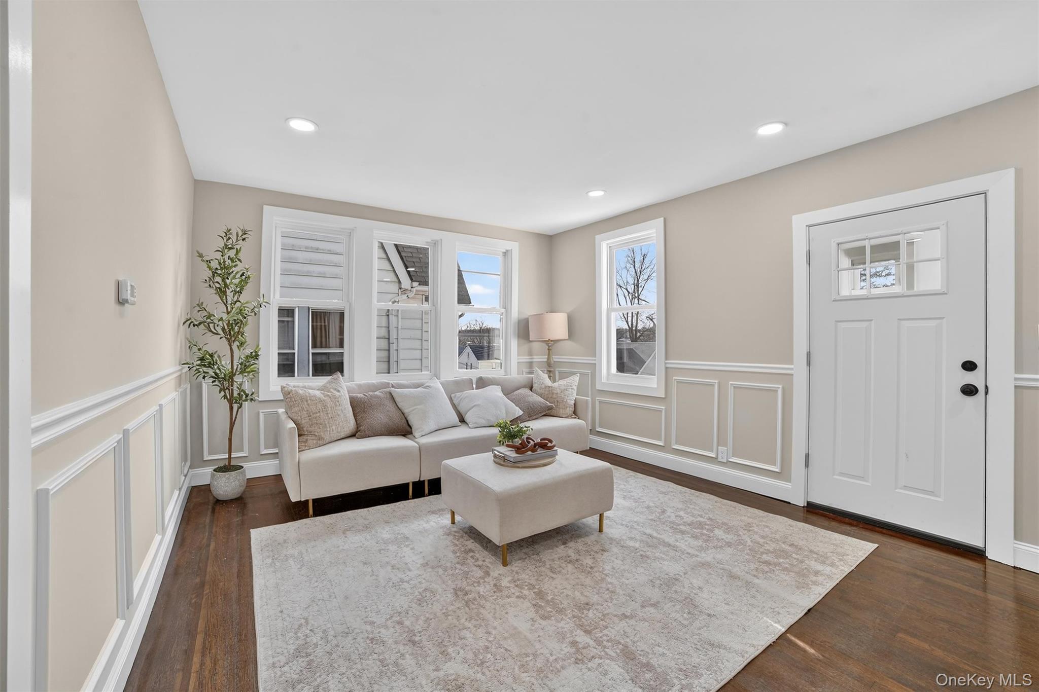 94 Jervis Road Yonkers, NY 10705 - Photo 3 of 50 a living room with furniture and a large window