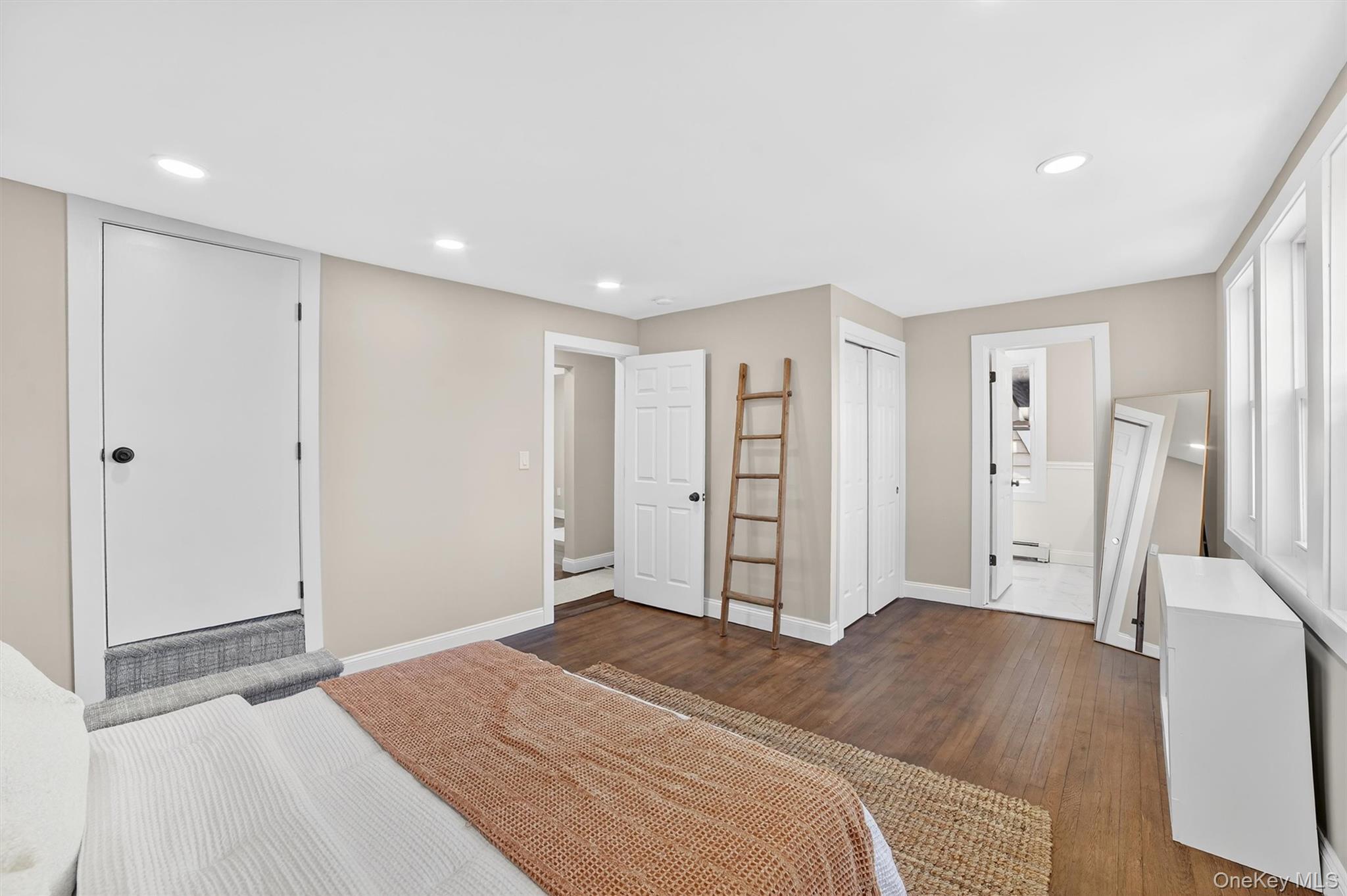 94 Jervis Road Yonkers, NY 10705 - Photo 33 of 50 a spacious bedroom with a bed and a closet