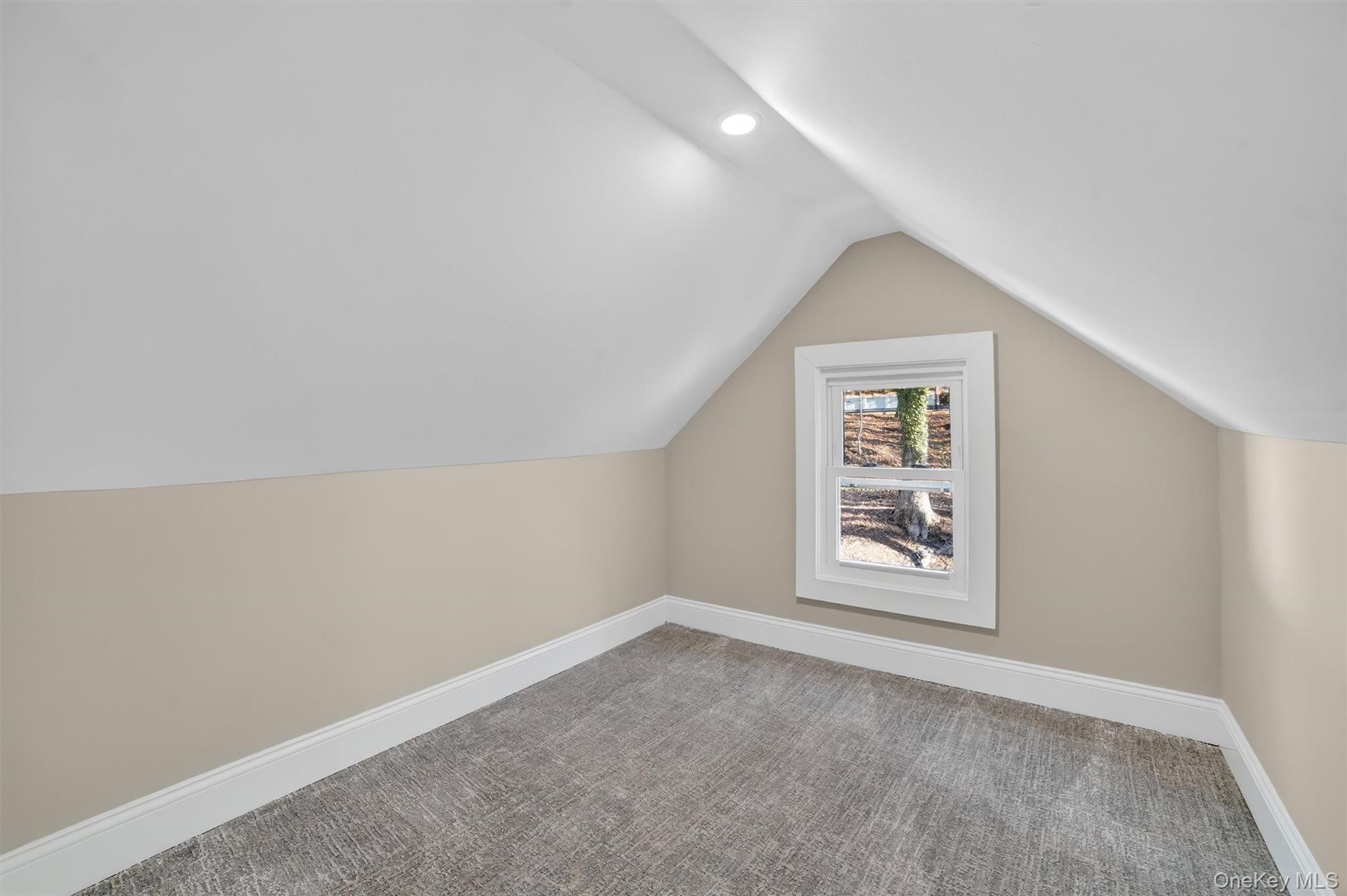 94 Jervis Road Yonkers, NY 10705 - Photo 38 of 50 an empty room with windows and cabinet