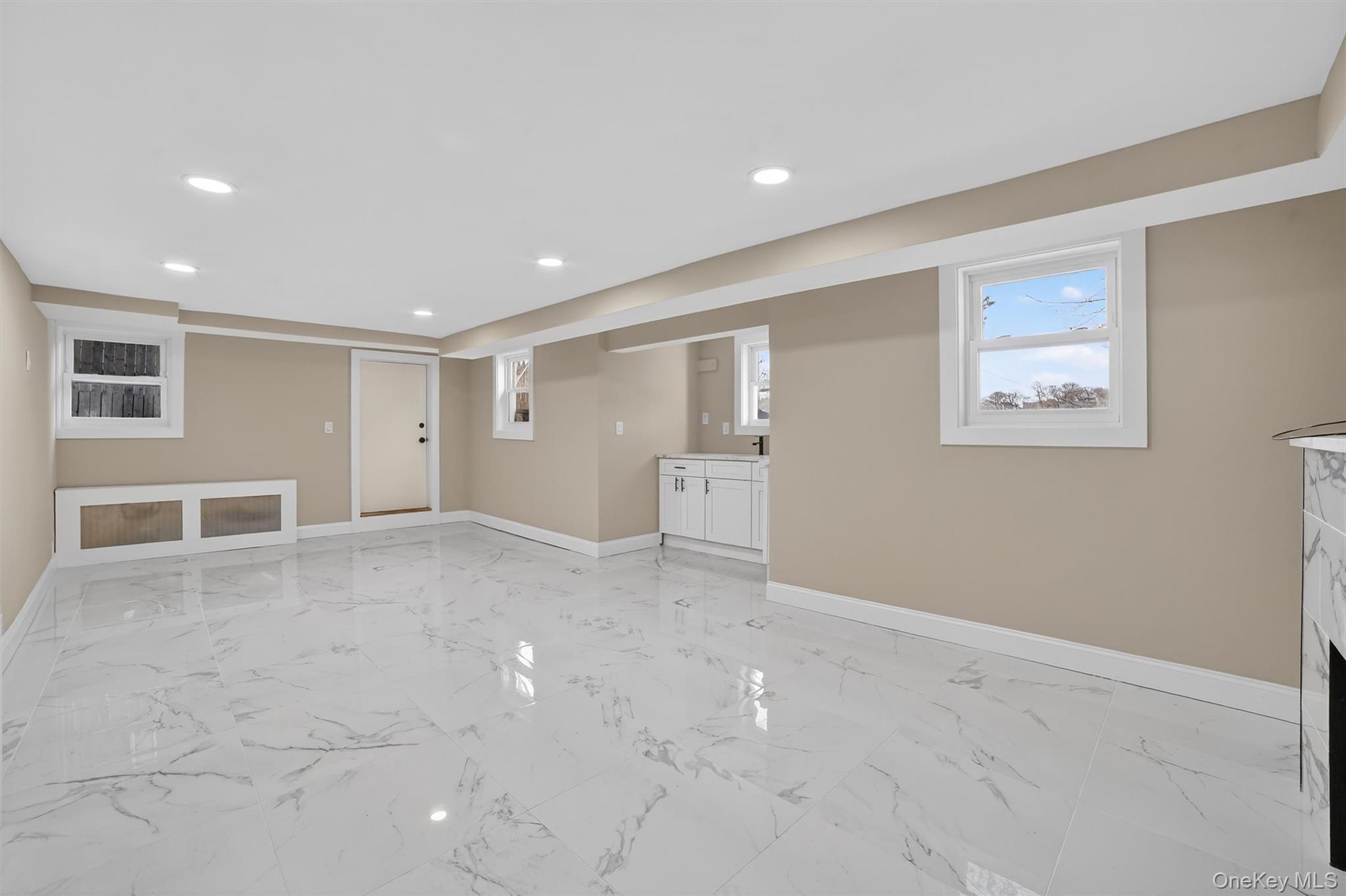 94 Jervis Road Yonkers, NY 10705 - Photo 41 of 50 a view of an empty room with a window