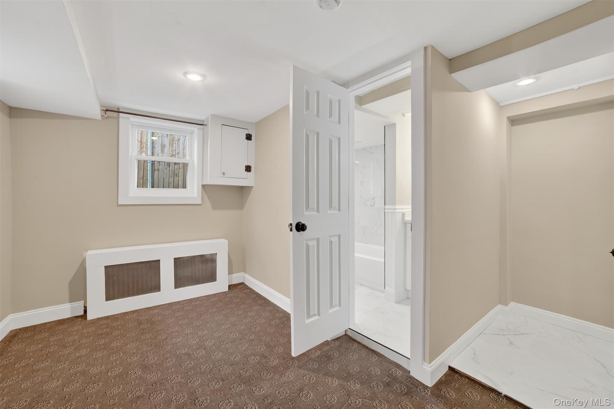 94 Jervis Road Yonkers, NY 10705 - Photo 46 of 50 a view of an empty room with a window