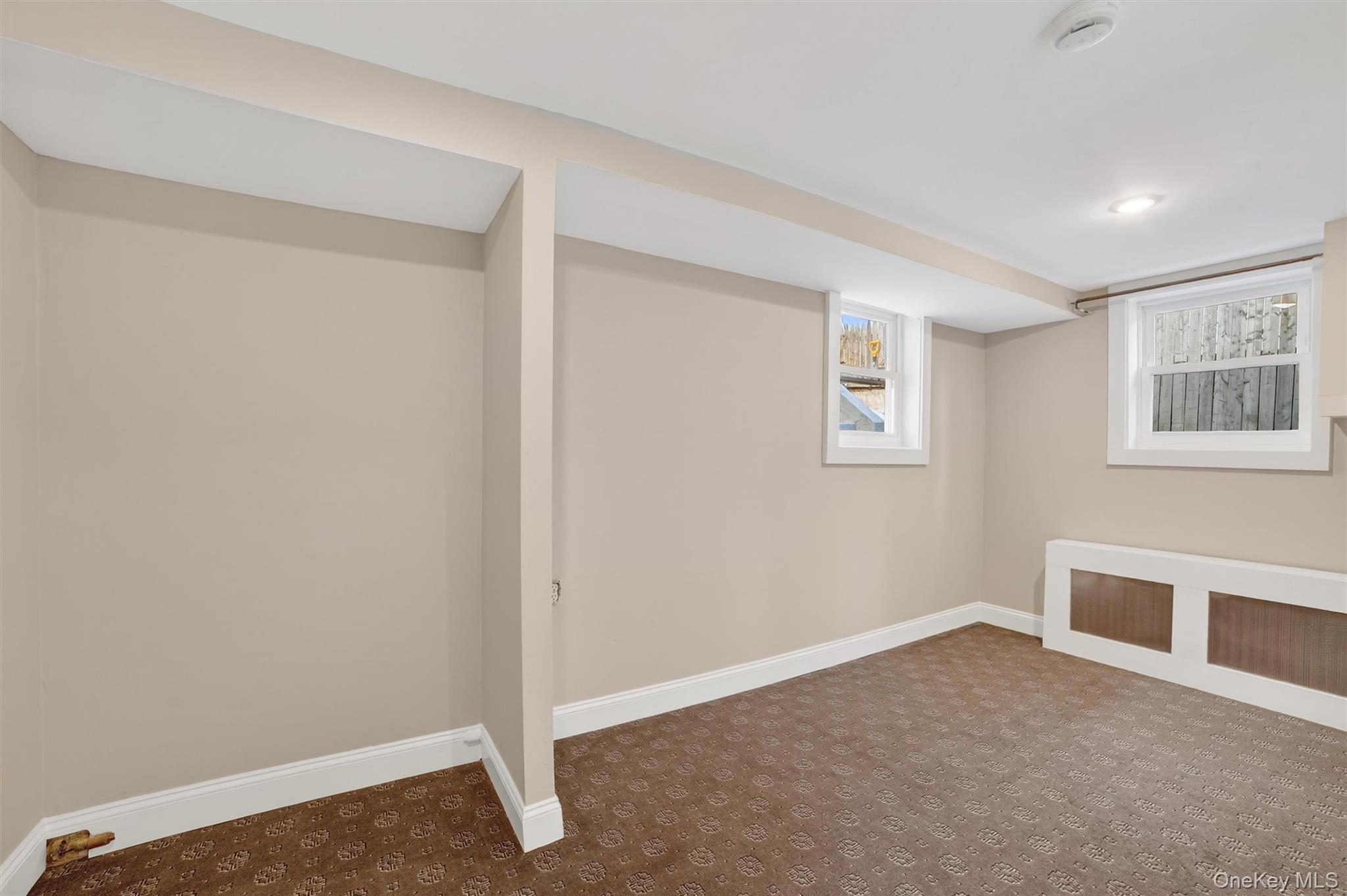 94 Jervis Road Yonkers, NY 10705 - Photo 47 of 50 a view of an empty room with a window