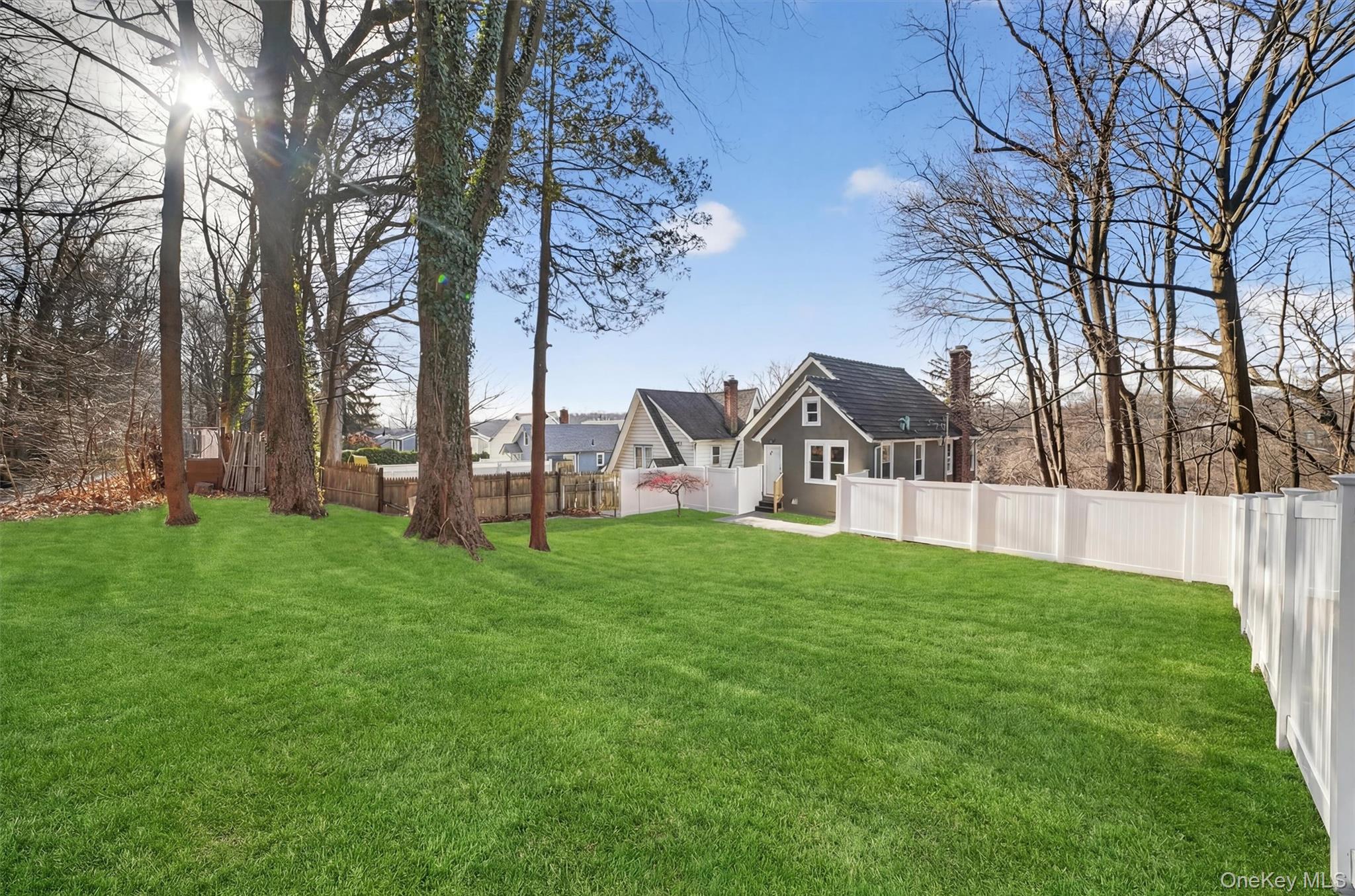 94 Jervis Road Yonkers, NY 10705 - Photo 48 of 50 a view of yard and house with outdoor seating and green space