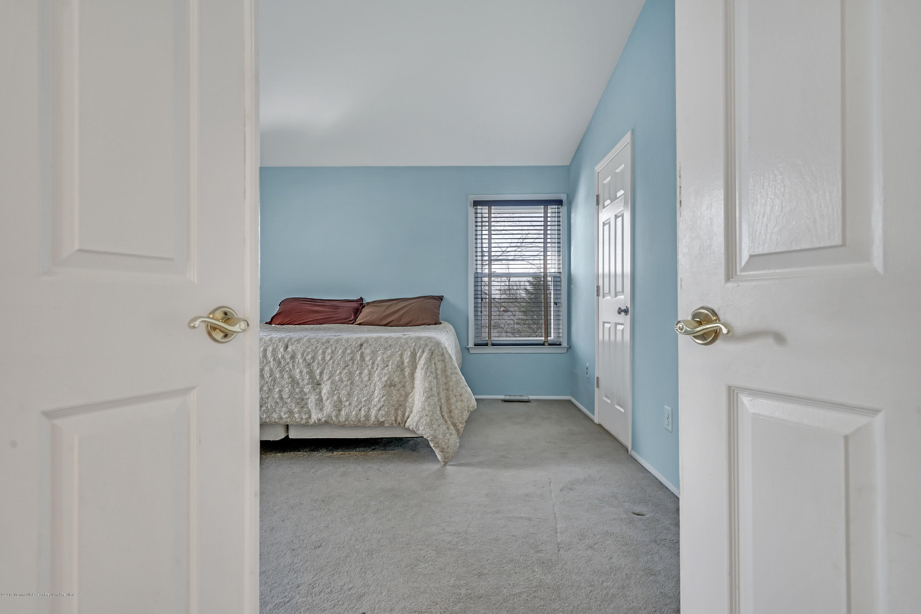 59 Marc Drive Howell, NJ 07731 - Photo 11 of 24 a bedroom with a bed and a window