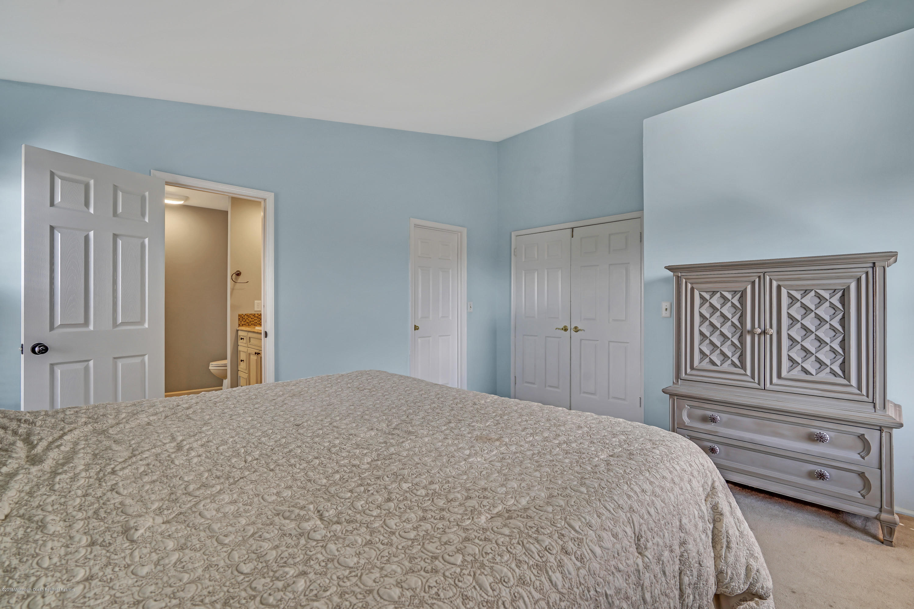 59 Marc Drive Howell, NJ 07731 - Photo 13 of 24 a bedroom with a bed and cabinets