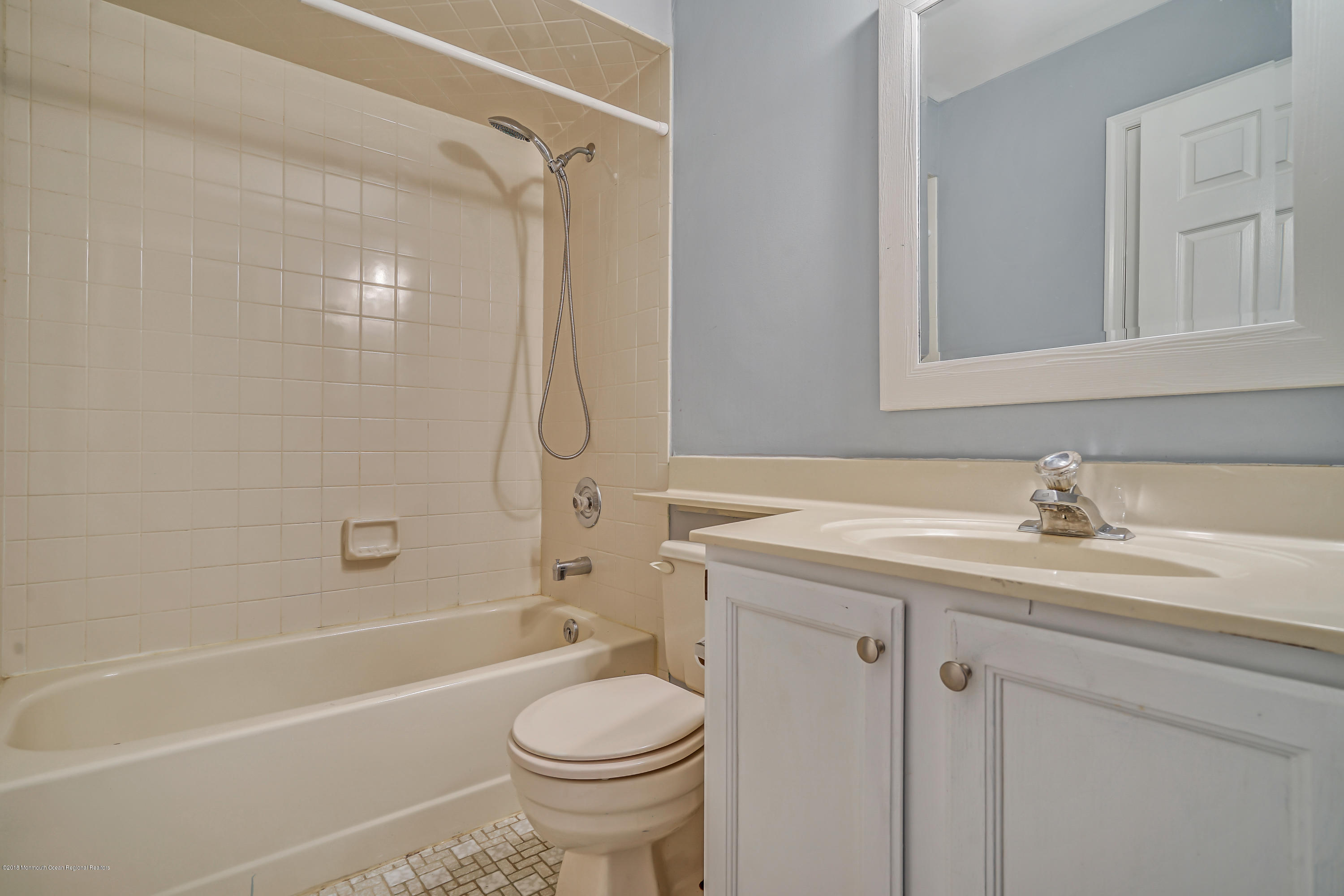 59 Marc Drive Howell, NJ 07731 - Photo 20 of 24 a bathroom with a sink toilet and shower