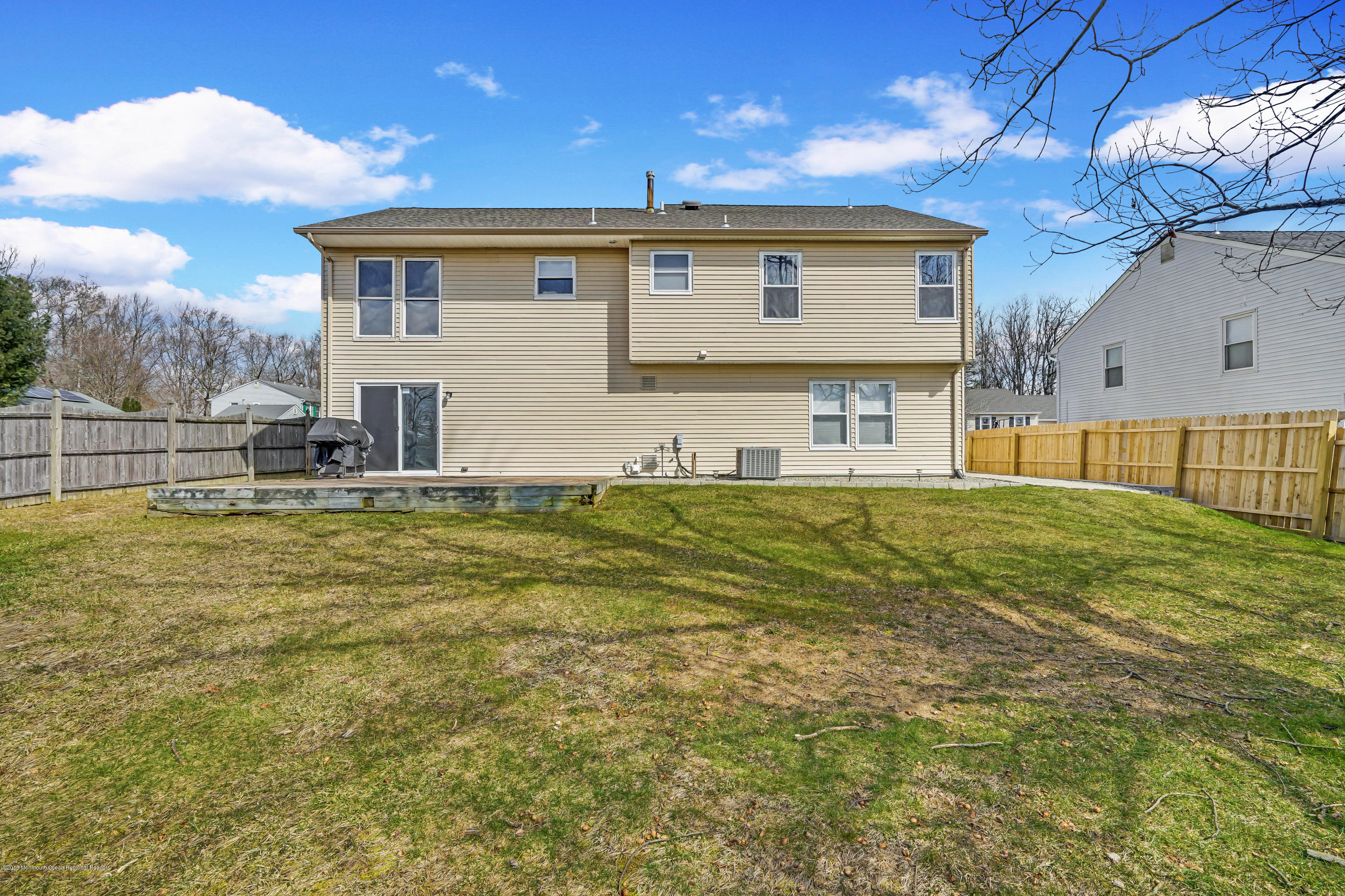 59 Marc Drive Howell, NJ 07731 - Photo 24 of 24 a front view of house with yard