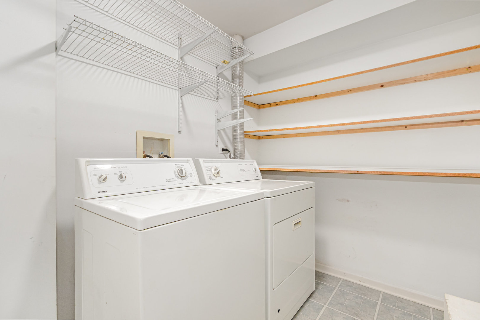 2211 Waterleaf Court, Unit 204 Naperville, IL 60564 - Photo 14 of 17 a utility room with dryer and washer