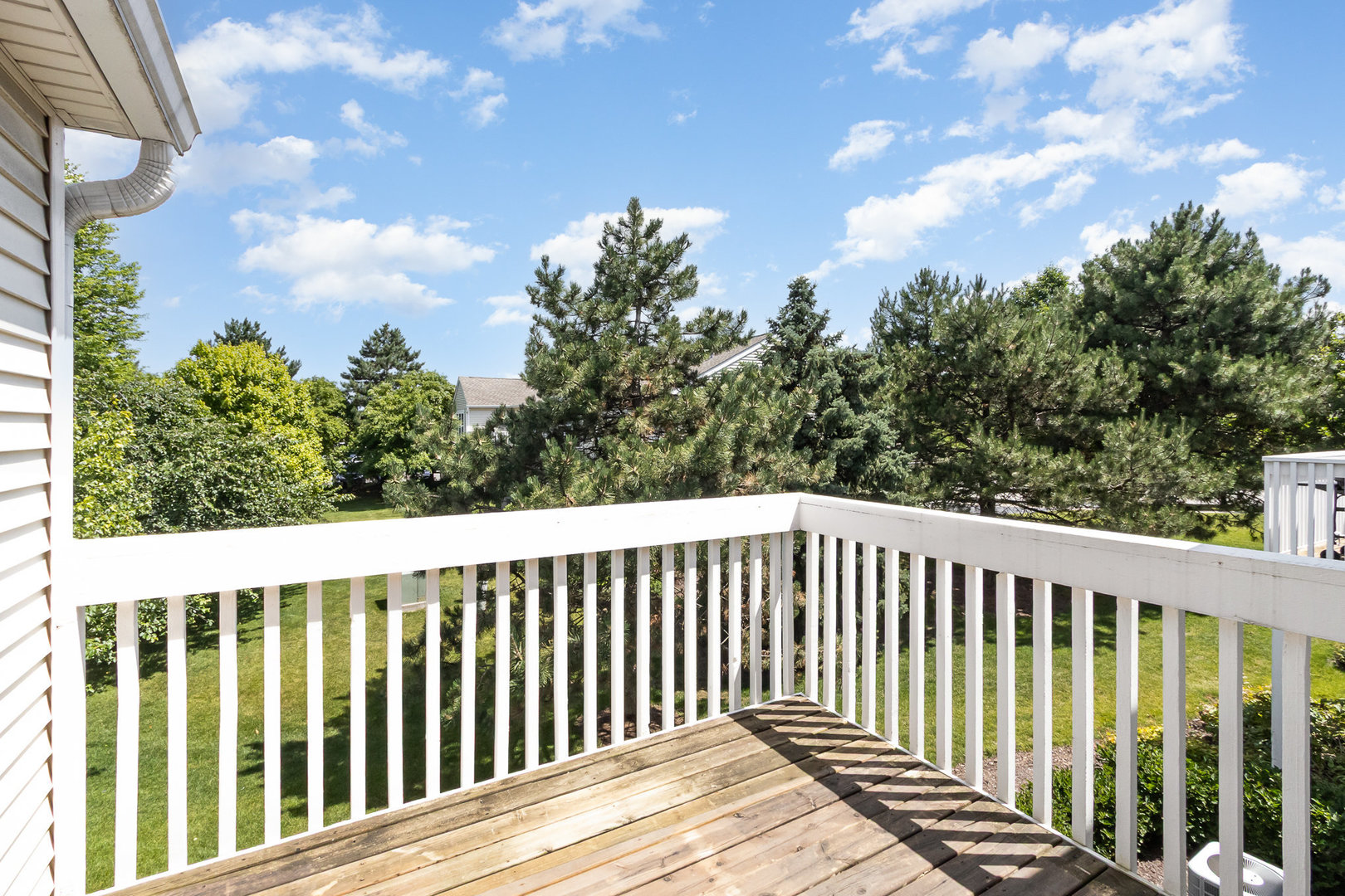 2211 Waterleaf Court, Unit 204 Naperville, IL 60564 - Photo 15 of 17 a view of a wooden fence