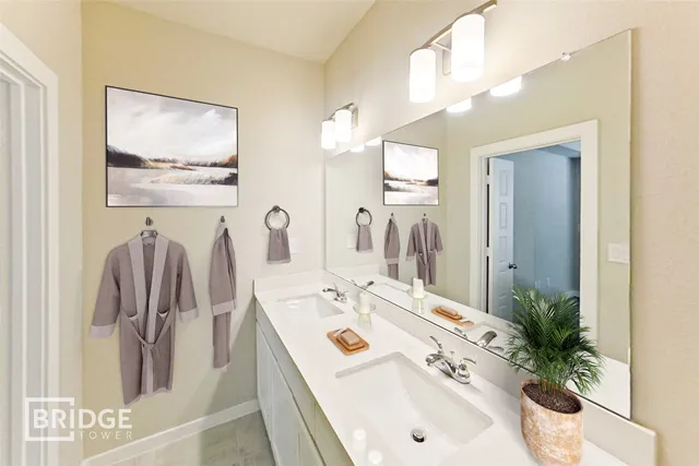 a utility room with multiple dryer and washer