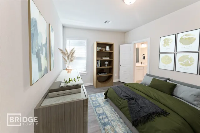 a bedroom with a bed and a window