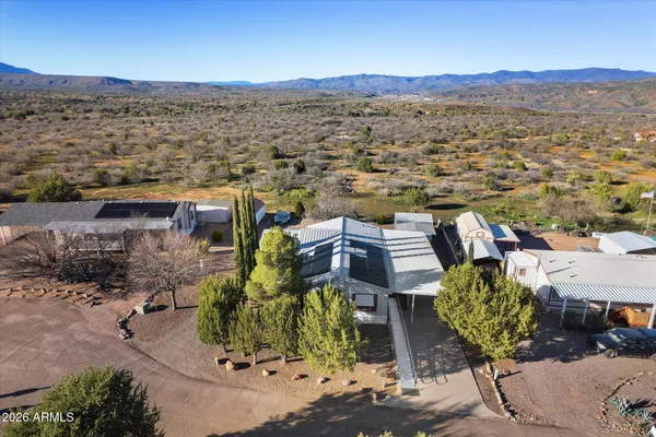 a view of a terrace with a lake view