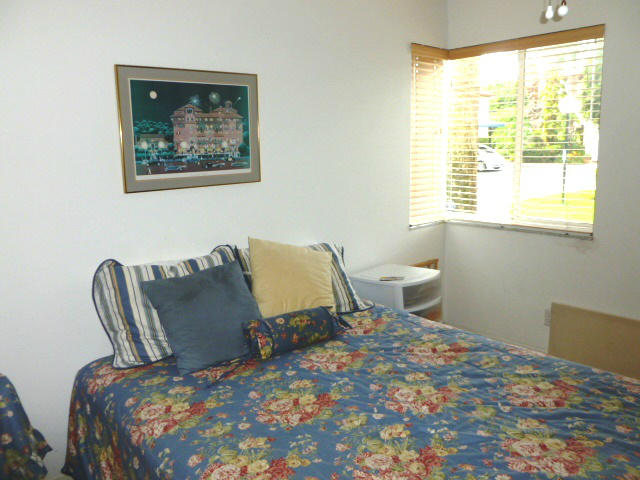 340 Northwest 67th Street, Unit 101 Boca Raton, FL 33487 - Photo 11 of 26 Second bedroom