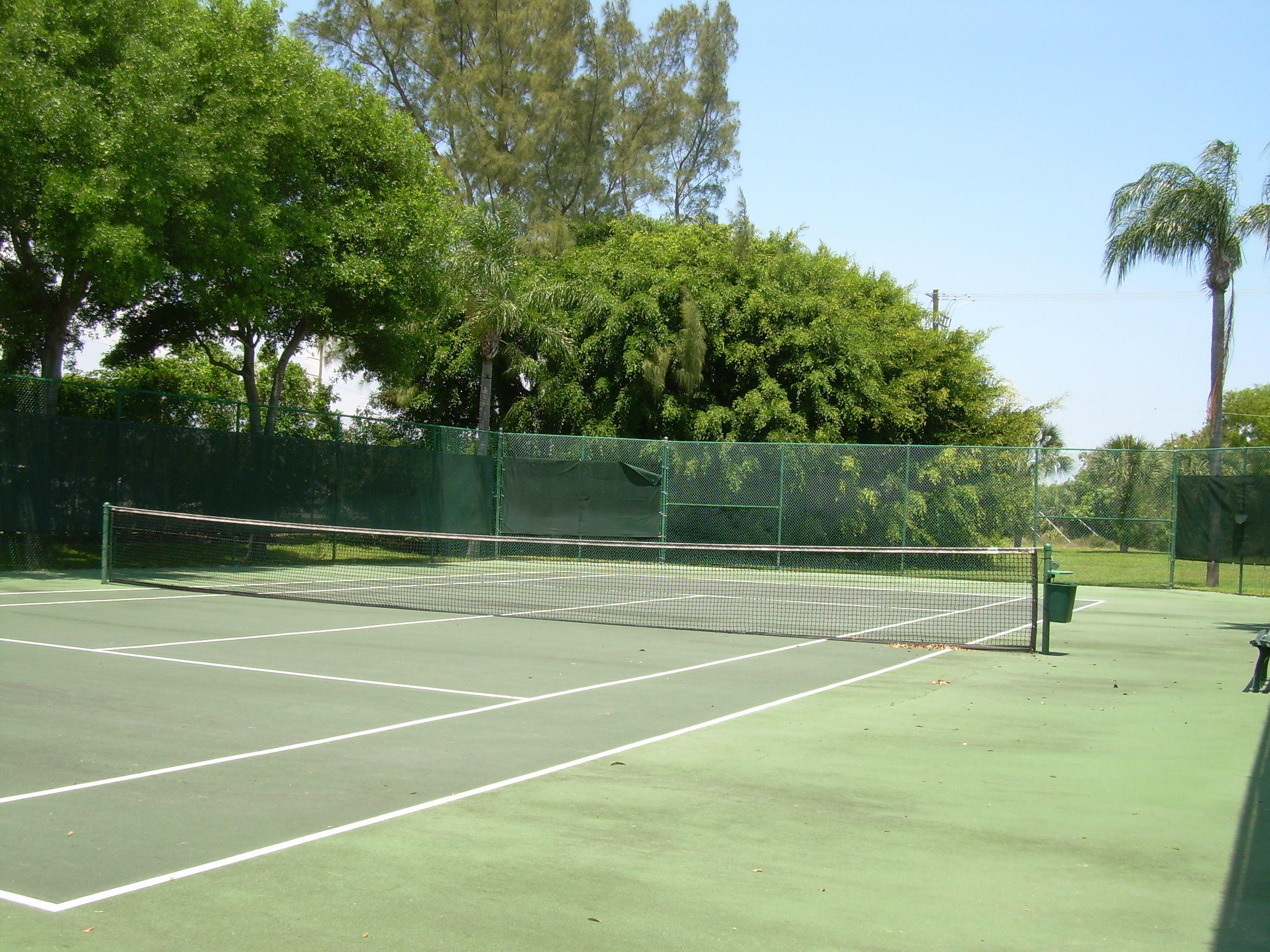 340 Northwest 67th Street, Unit 101 Boca Raton, FL 33487 - Photo 22 of 26 Tennis court