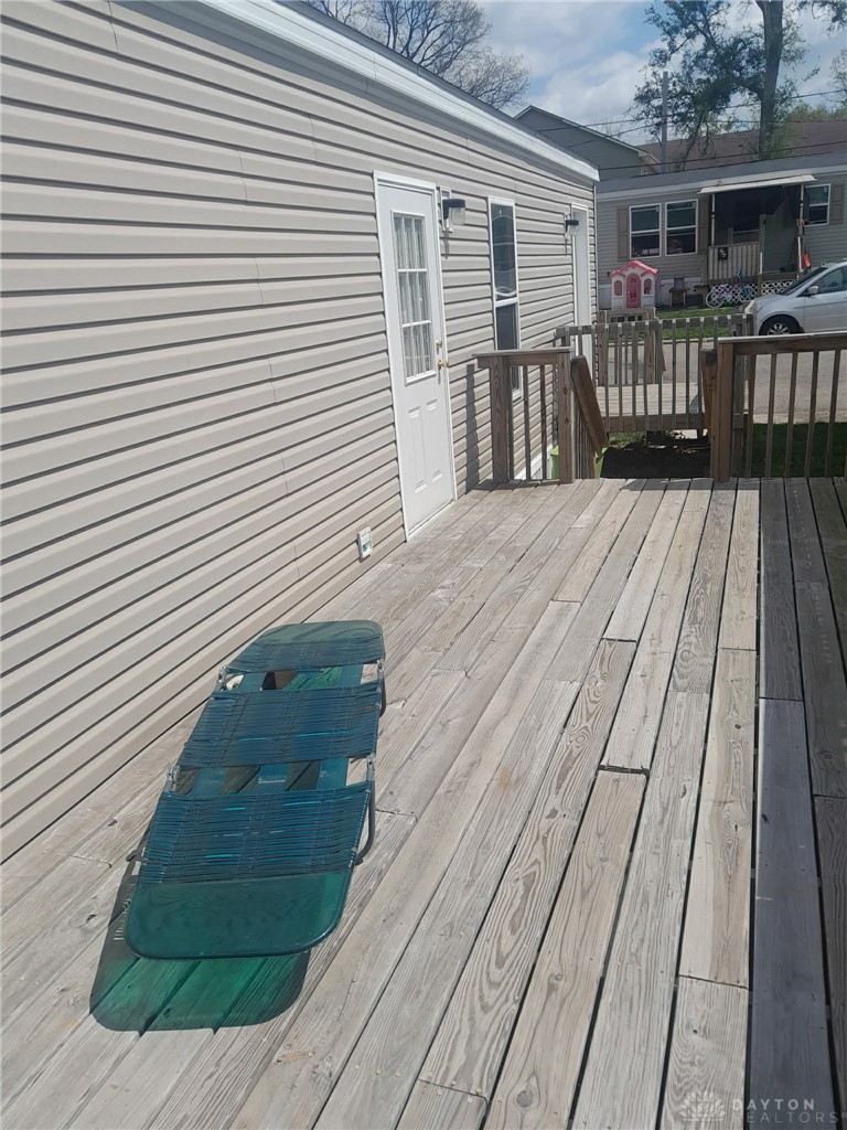 239 Billwood Road Dayton, OH 45431 - Photo 3 of 3 This spacious wooden deck offers an inviting outdoor extension to the home.