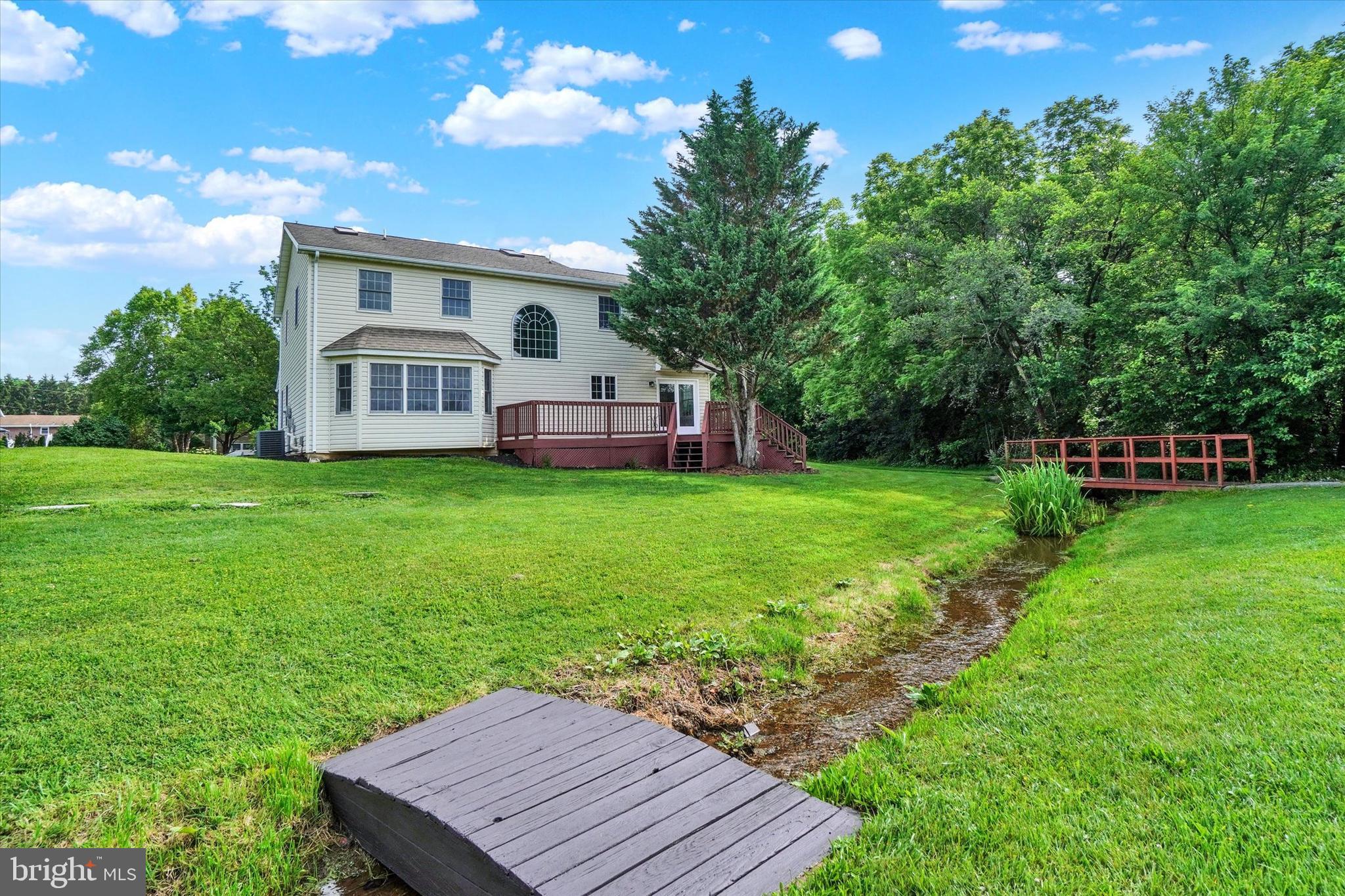 105 Margate Road York, PA 17408 - Photo 37 of 43 a view of a house with a backyard porch and sitting area