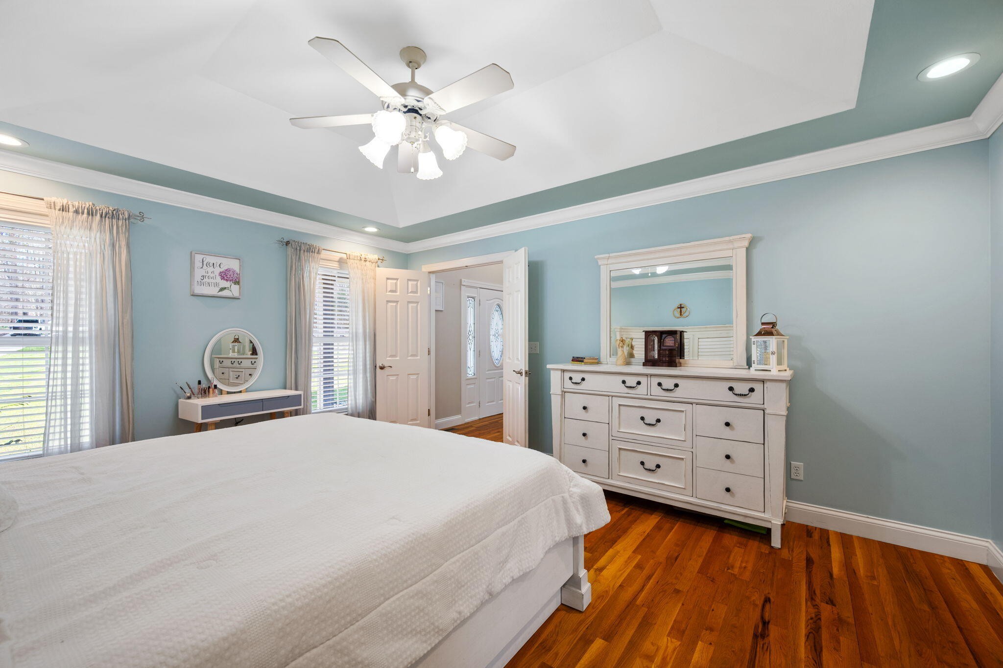 153 Nix Road Dunlap, TN 37327 - Photo 24 of 61 a bedroom with a bed and a chandelier