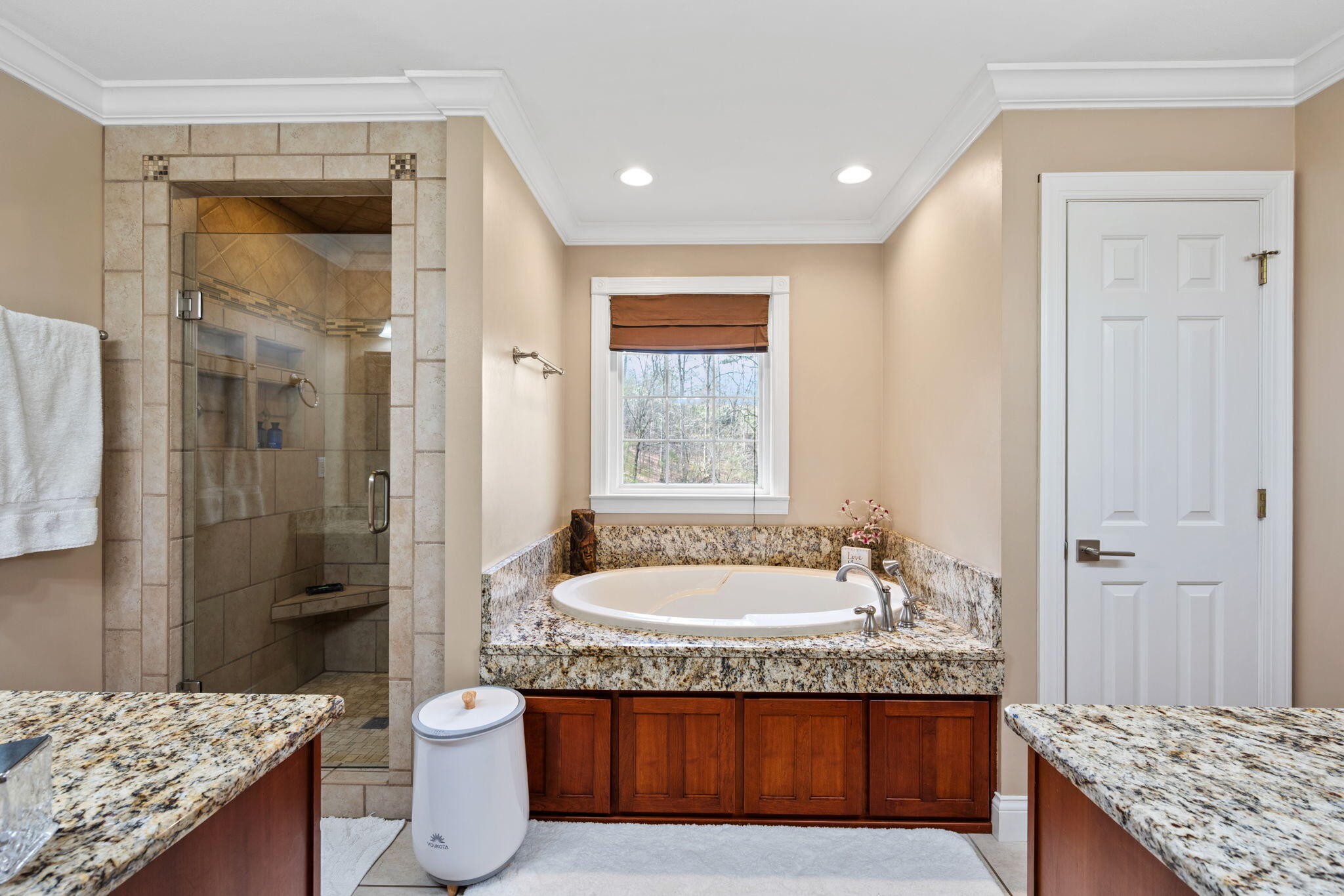 153 Nix Road Dunlap, TN 37327 - Photo 25 of 61 a bathroom with a granite countertop tub sink and mirror