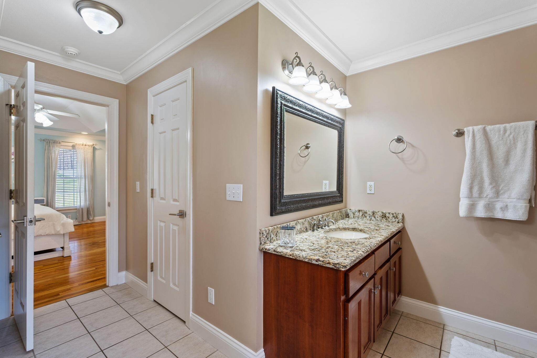 153 Nix Road Dunlap, TN 37327 - Photo 27 of 61 a bathroom with a granite countertop sink and a mirror