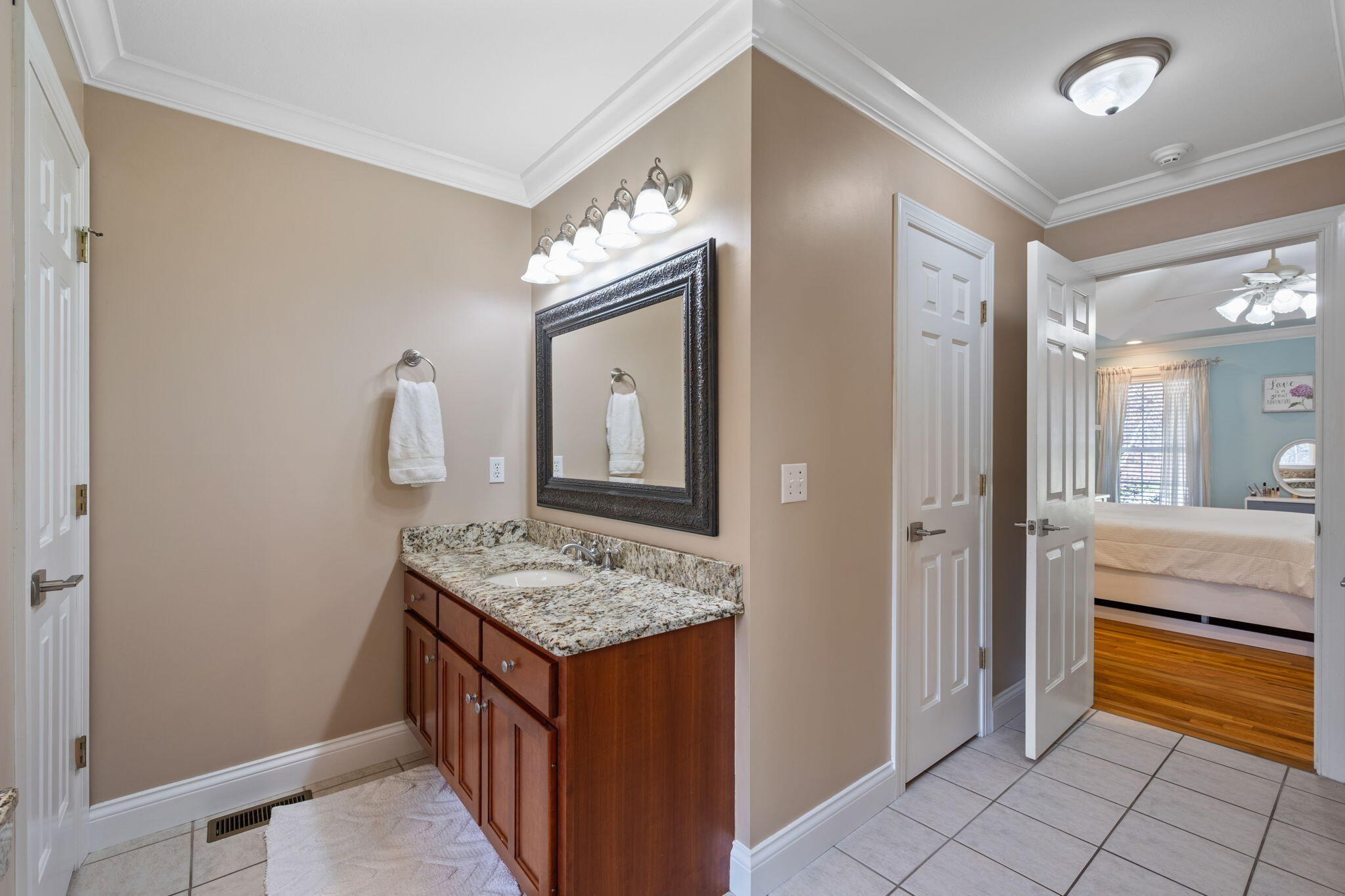 153 Nix Road Dunlap, TN 37327 - Photo 28 of 61 a bathroom with a granite countertop sink and a mirror