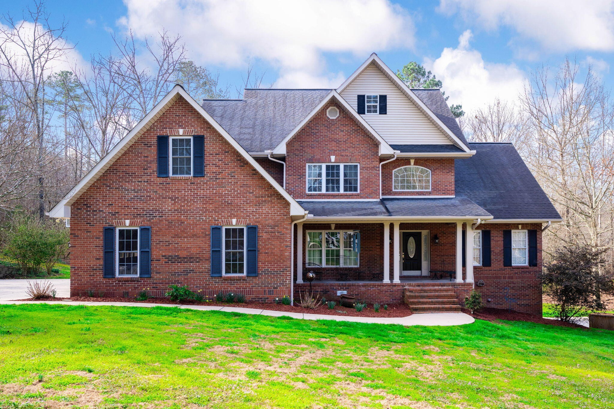 153 Nix Road Dunlap, TN 37327 - Photo 3 of 61 a front view of a house with a yard