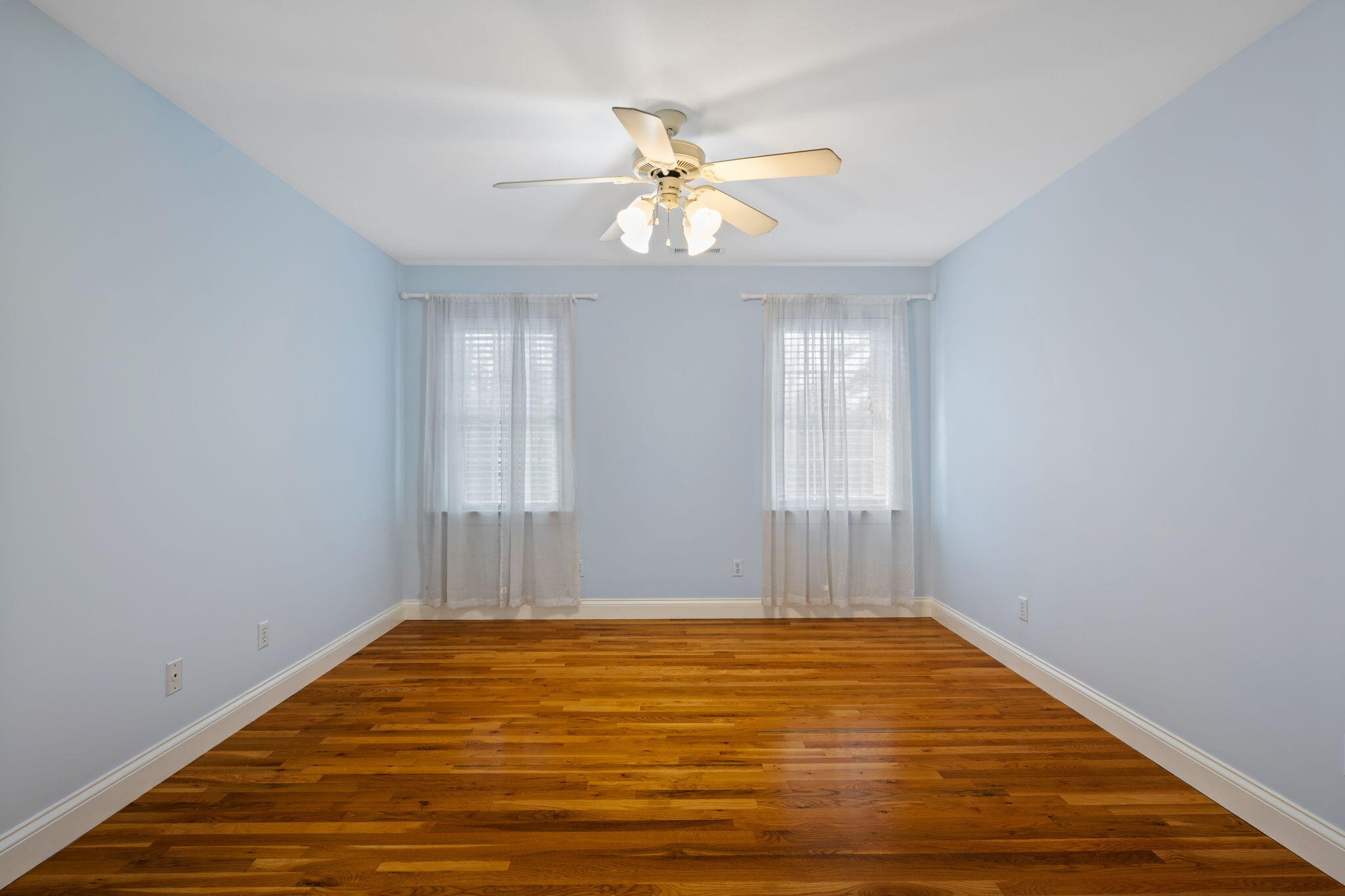 153 Nix Road Dunlap, TN 37327 - Photo 31 of 61 an empty room with wooden floor fan and windows