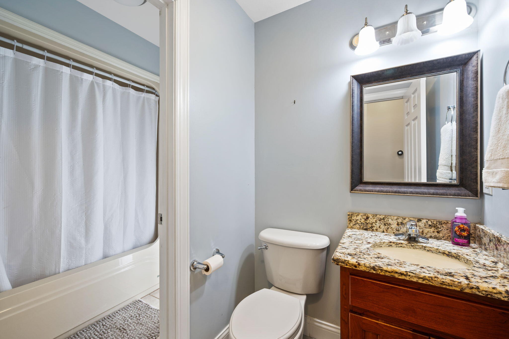 153 Nix Road Dunlap, TN 37327 - Photo 32 of 61 a bathroom with a granite countertop sink and a mirror