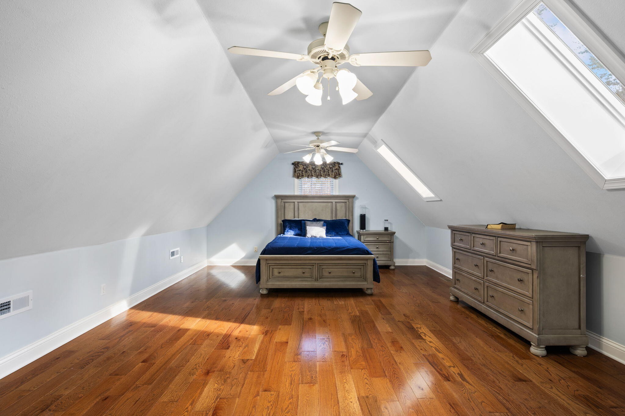 153 Nix Road Dunlap, TN 37327 - Photo 34 of 61 a living room with hard wood floors and a ceiling fan