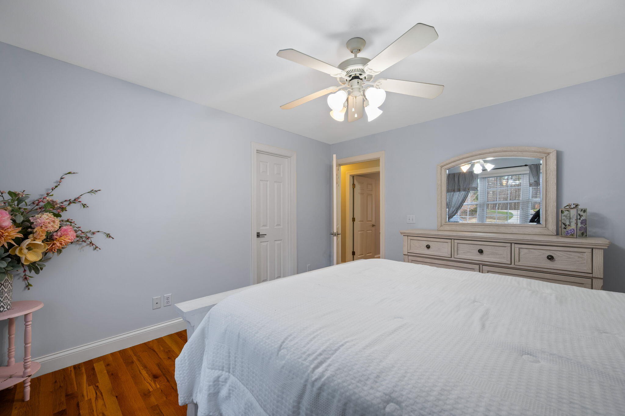 153 Nix Road Dunlap, TN 37327 - Photo 36 of 61 a bedroom with a bed and a chandelier