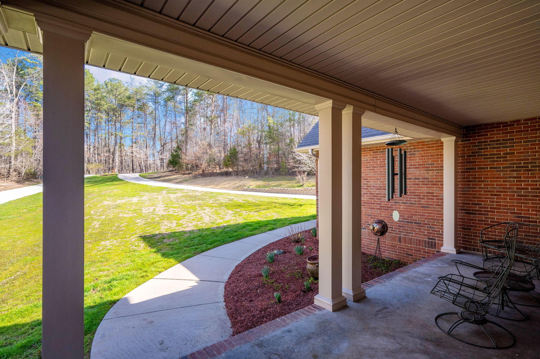 153 Nix Road Dunlap, TN 37327 - Photo 54 of 61 a view of a balcony with floor to ceiling windows with wooden floor
