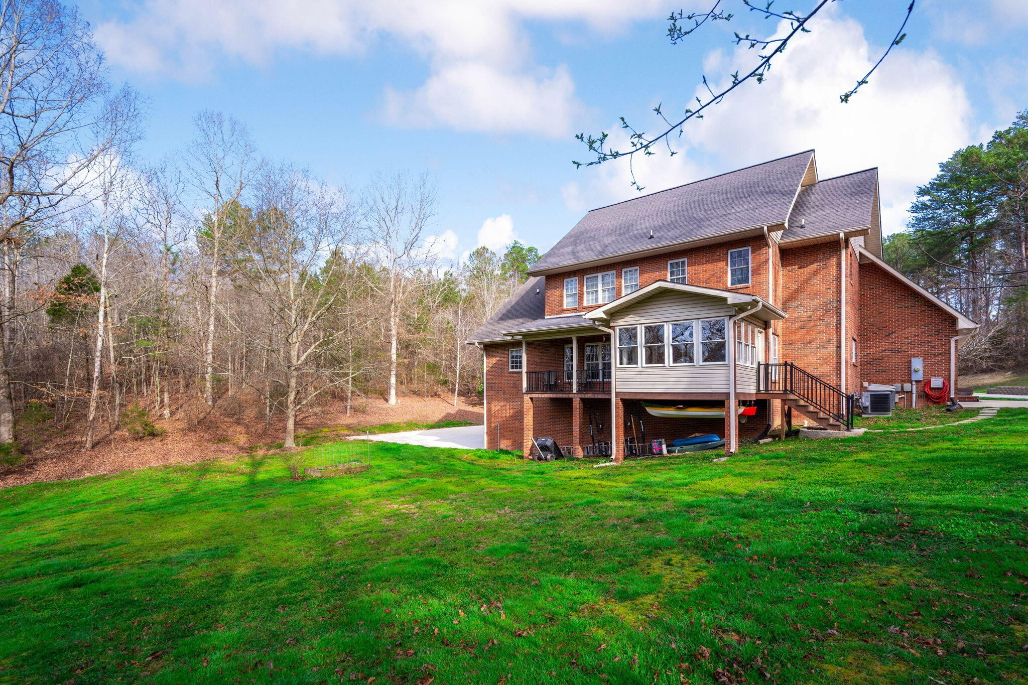 153 Nix Road Dunlap, TN 37327 - Photo 56 of 61 a view of a house with a yard porch and sitting area