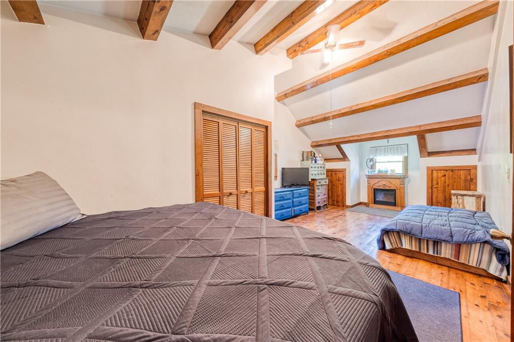 321 Westminster Road Sarver, PA 16055 - Photo 15 of 25 a large bed sitting in a bedroom next to a window