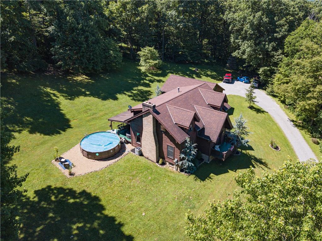 321 Westminster Road Sarver, PA 16055 - Photo 24 of 25 an aerial view of a house with yard swimming pool and outdoor seating