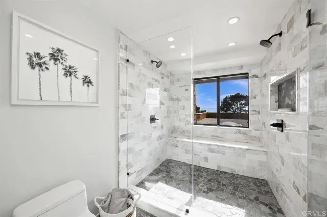 a bathroom with a bathtub sink and toilet