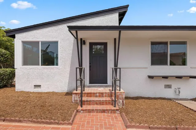 a front view of a house with a window
