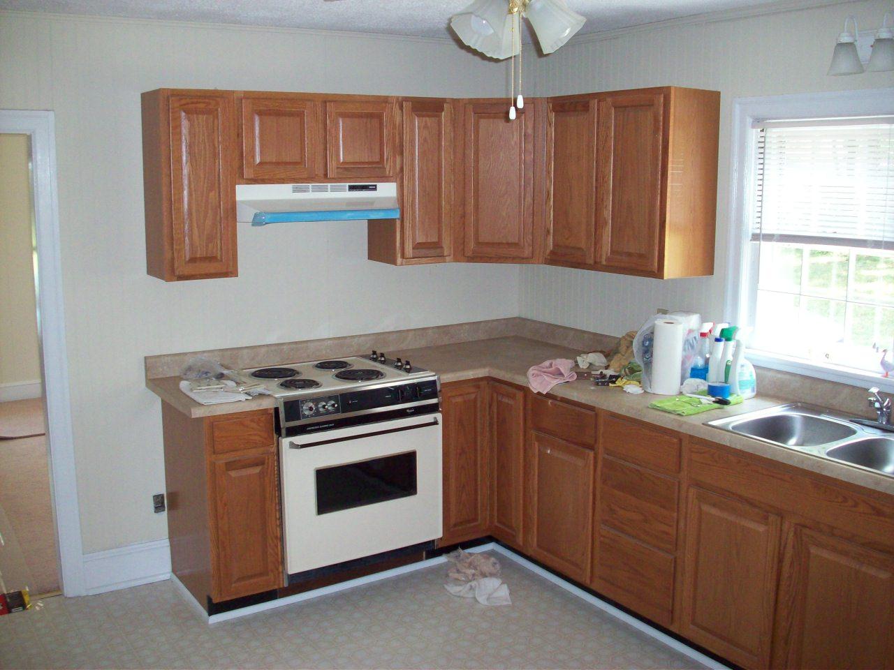 1609 Riverside Terrace Southeast Roanoke, VA 24014 - Photo 2 of 6 a kitchen with granite countertop wood cabinets stainless steel appliances and a window